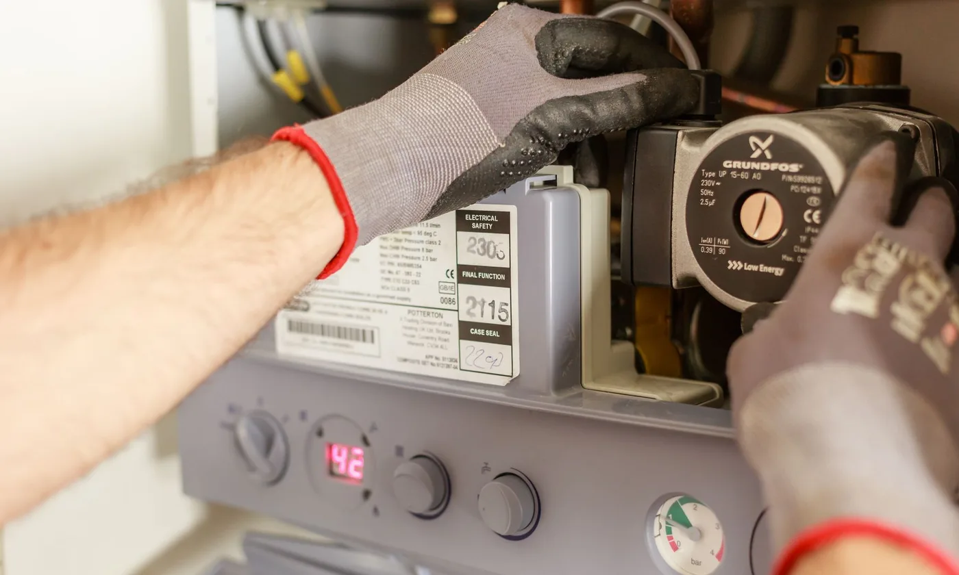 Technician servicing pumped equipment