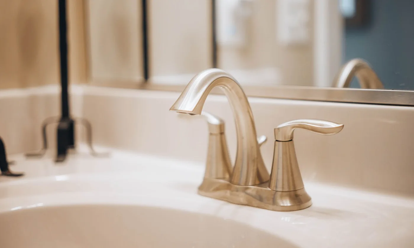 Newly installed modern bathroom faucet