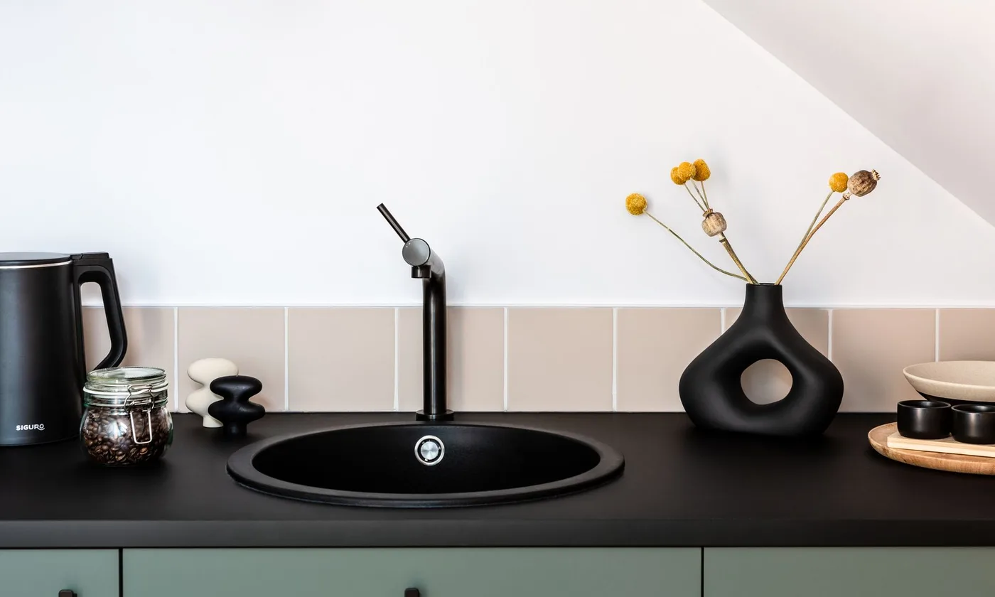 Kitchen sink with a garburator underneath