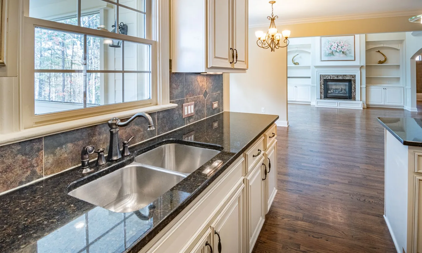 Kitchen with granite counters and a stainless steel sink