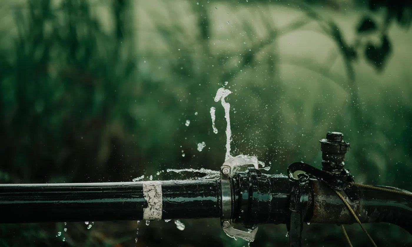 Water escaping from a failed pipe - emergency plumbing Vancouver