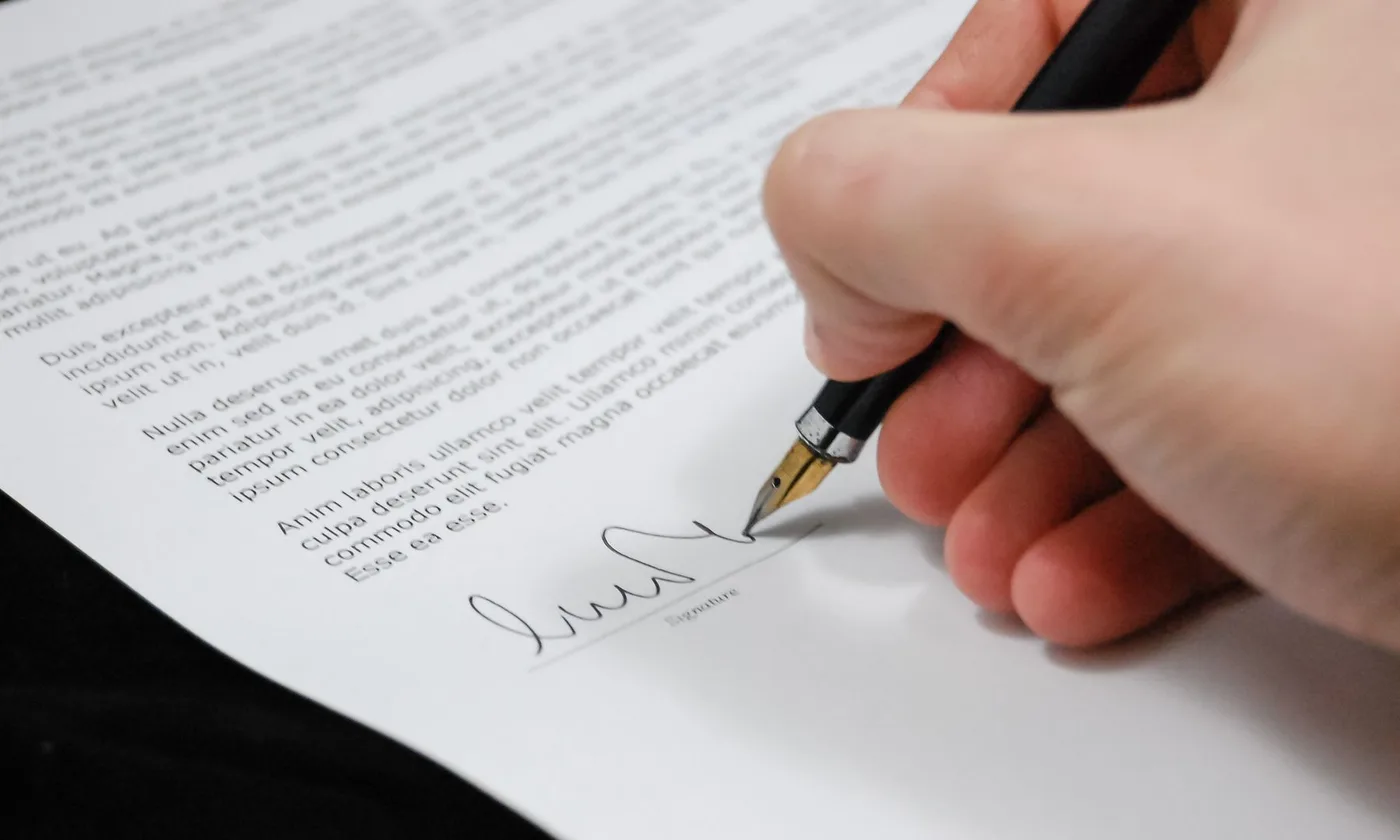 Signing a financing agreement for plumbing work